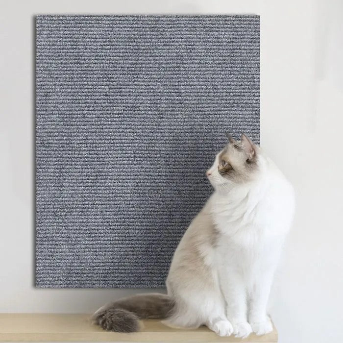 Tapis griffoir adhésif Petify gris en tissu pour protéger les meubles des griffes de chat.